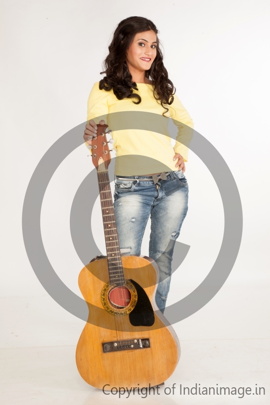 Girl Posing with Guitar