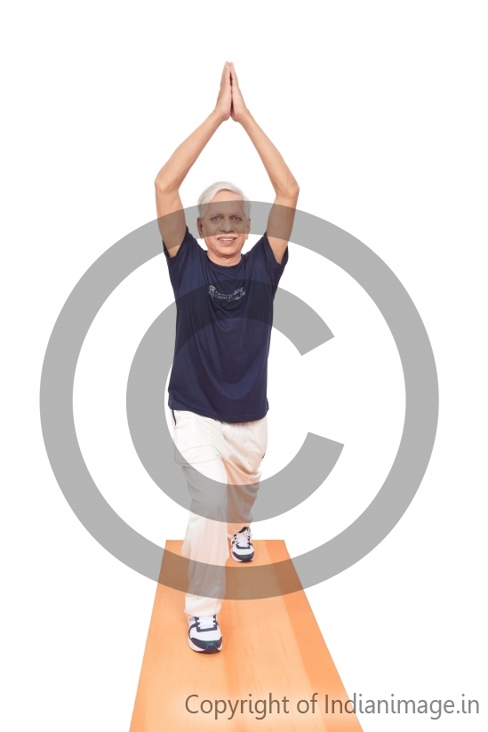 Elderly man doing Yoga