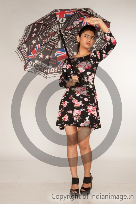 Girl Using Umbrella for Sun Protection