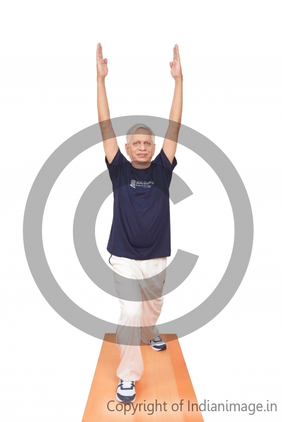 Elderly man doing Yoga